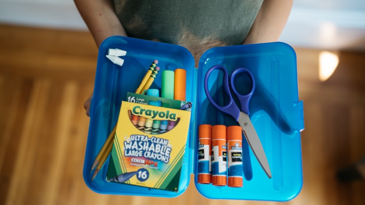 a bag of scissors and a package of scissors on a table