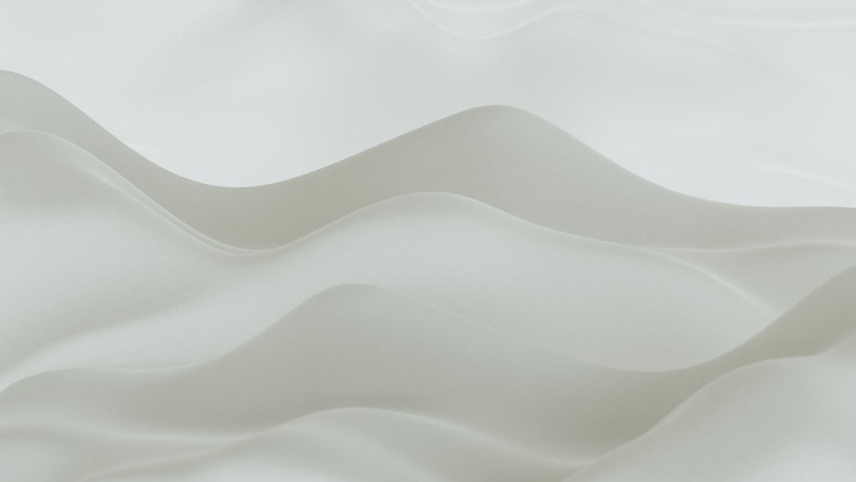 a close up view of a wavy white surface